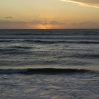 Sonnenuntergang am Strand des Sunset Beach Holiday Park